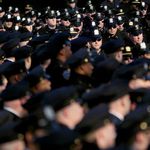 Police from across the nation line up for the funeral of slain NYPD Officer Peter Figoski